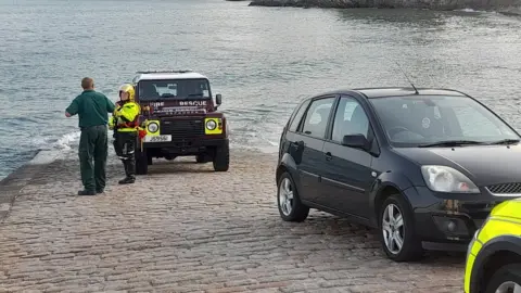 BBC Fire and rescue services talking on slipway