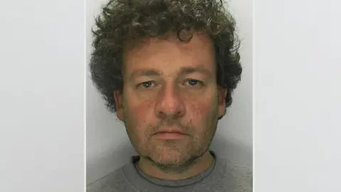 Gloucestershire Police A police custody mugshot of Matthew Corry