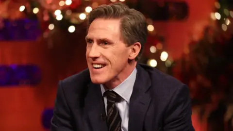 PA Media Rob Brydon