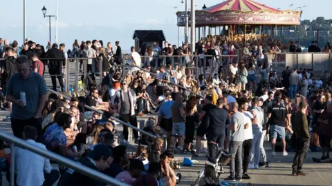 Matthew Horwood People congregating at Cardiff Bay