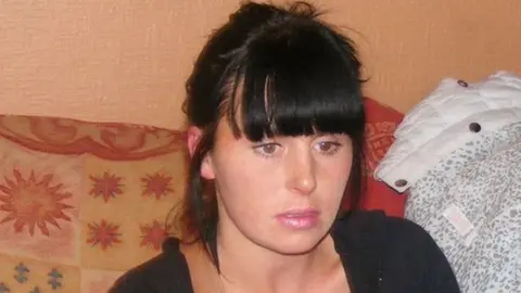 Family handout Tina Robson feeds a baby from a bottle