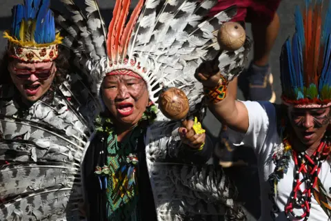 Andressa Anholete/Getty Images Indigenous women take part in the III Indigenous Women's March summoned by ANMIGA and APIB on September 13, 2023 in Brasilia, Brazil.