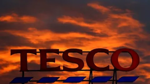 Reuters Tesco store sign