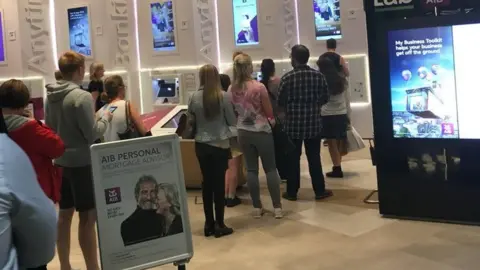 Reuters Queues at ATM in Dublin