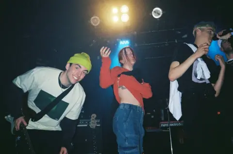 BBC Kate Price (centre) and James Keys (right) on stage