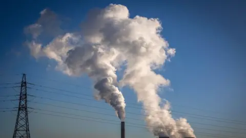 Getty Images Smoke from chimneys