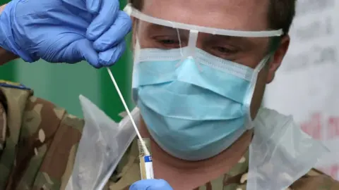 Getty Images man with swab