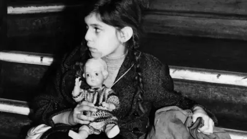 Getty Images Eight year-old Josepha Salmon, one of the children saved by the Kindertransport trains, arrived at Harwich in Essex in 1939