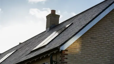 Getty Images Solar panels on roof