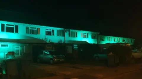 Chinnor homes lit up green