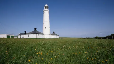 Getty Images A view of Nash Point lighthouse on the headland, Vale of Glamorgan, South Wales, circa 1985