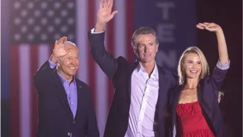 Getty Images President Biden campaigned with Mr Newsom one day before the vote.