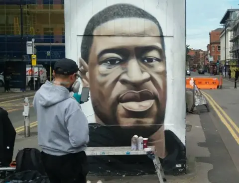 MCC Akse and his George Floyd mural