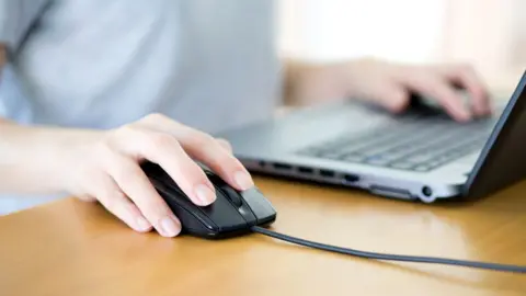 Getty Images A person using a computer