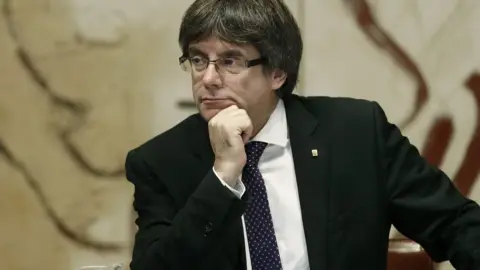 EPA Catalan regional President Carles Puigdemont chairs the Catalan Government"s weekly meeting in Barcelona