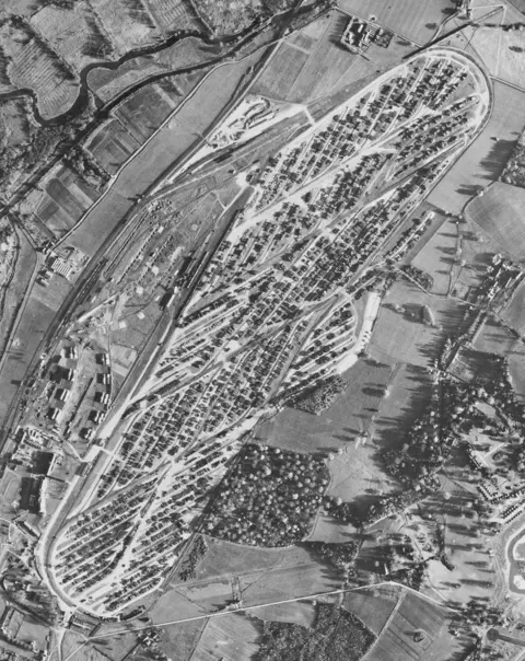 Historic England Archive/USAAF P A photo of Newbury Racecourse marshalling yard, 2 December 1943