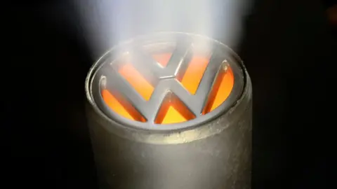 Ullstein Bild / Getty Images Volkswagen car exhaust pipe