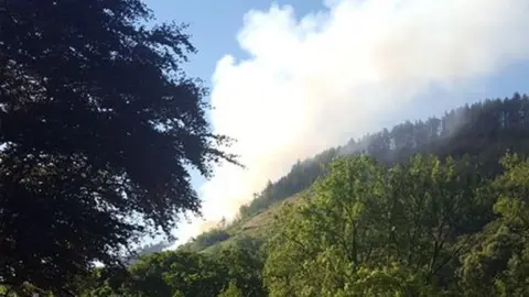 Kim Moseley Smoke was still coming from the mountain on Friday morning