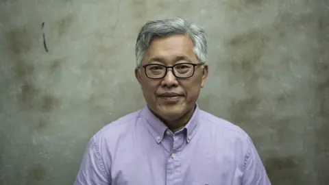 Getty Images Jin Mingri, head pastor of the Zion church