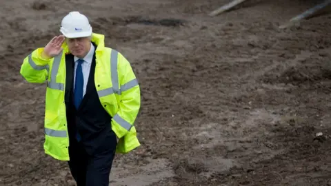 PA Boris Johnson on a building site