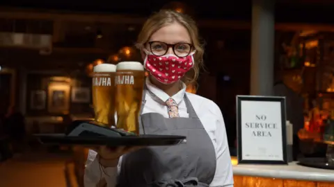 Pacemaker Waitress serving pints