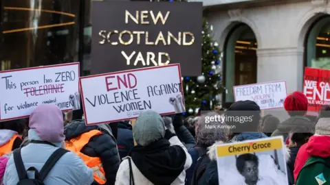 Getty Images Women outside Scotland Yard