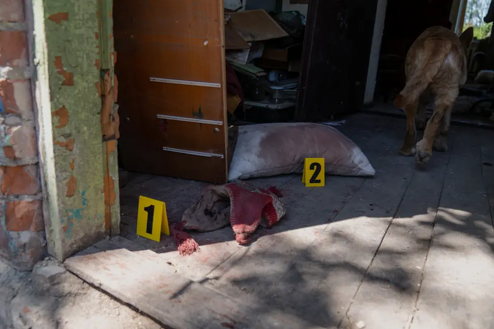 BBC Investigators placed evidence markers next to relevant evidence, in this case blood stains.