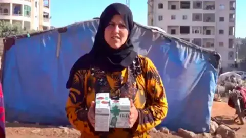 Gift Wellness Syrian woman receives pads