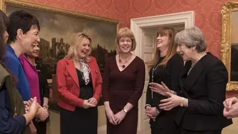 10 Downing Street Theresa May with a number of female MPs appointed as whips