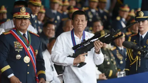 Reuters President Rodrigo Duterte at a police event (April 2018)