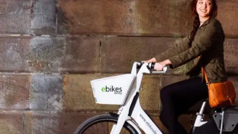 Derby City Council Woman on an e-bike