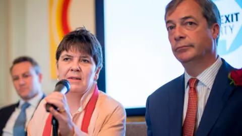 Tolga Akmen/Getty Images Claire Fox with Nigel Farage