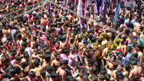 People celebrating the festival of Holi on 30 March without following any safety protocol