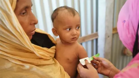 BBC Mother and child in Bangladesh refugee camp