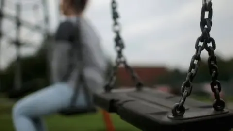 Getty Images A child on a swing