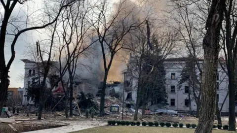 Reuters A view shows Donetsk Regional Theatre of Drama destroyed by an airstrike