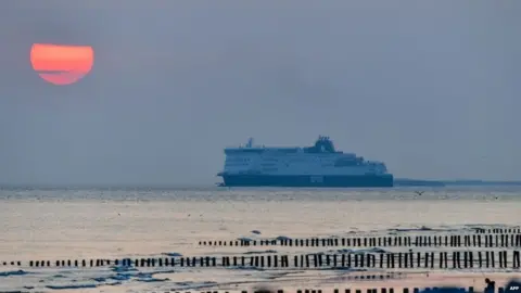 AFP A ferry outside Calais