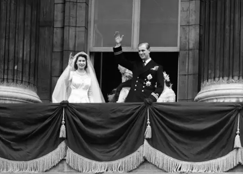 PA Princess Elizabeth and the Duke of Edinburgh on the balcony of Buckingham Palace