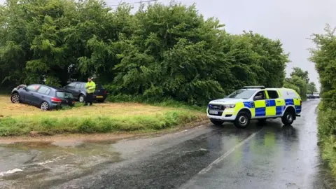 BBC police car blocks road