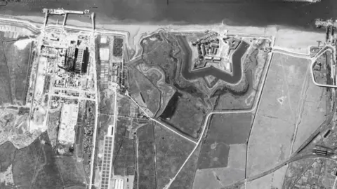 Historic England A photograph shows the distinctive star-shaped 17th-century Tilbury Fort with its moated earthen defences guarding the River Thames