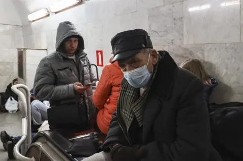 EPA Ukrainian people shelter in Pushkinskaya underground station in Kharkiv, Ukraine, 24 February 2022.