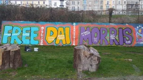 Family handout Graffiti calling for the release of David Morris in Clydach