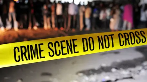 Getty Images Police tape used at a crime scene