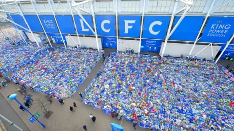 Getty Images Tributes outside Leicester's stadium