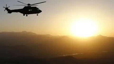 AFP A French Cougar helicopter over Afghanistan, July 20912