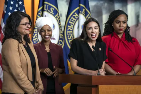 Jim Lo Scalzo / EPA Democratic Representatives Rashida Tlaib, Ilhan Omar, Alexandria Ocasio-Cortez and Ayanna Pressley speak out in the US Capitol in Washington, DC, USA. 15 July 2019.
