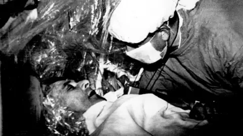 Getty Images Christian Barnard examines the progress of his patient Louis Washkansky