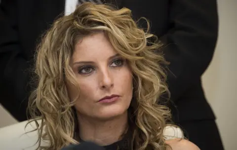 Getty Images Summer Zervos at a press conference to announce the filing of a lawsuit against President-elect Donald Trump, in Los Angeles, California, on 17 January 2017