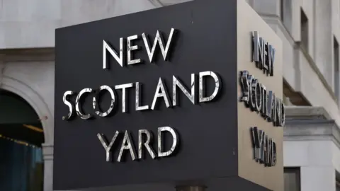 PA Media New Scotland Yard sign