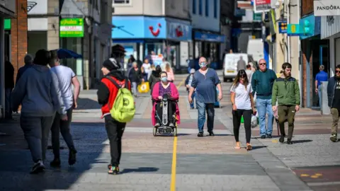 PA Media Merthyr Tydfil high street shoppers